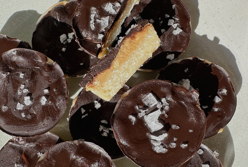 RAW SALTED ALMOND PEANUT BUTTER CUPS.